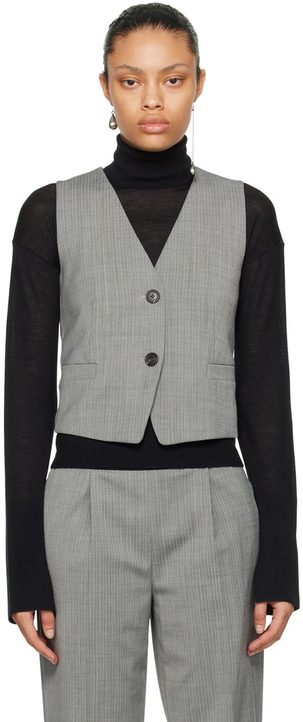 Серо-черный жилет с вырезом Helmut Lang
Серо-черный жилет с вырезом Helmut Lang