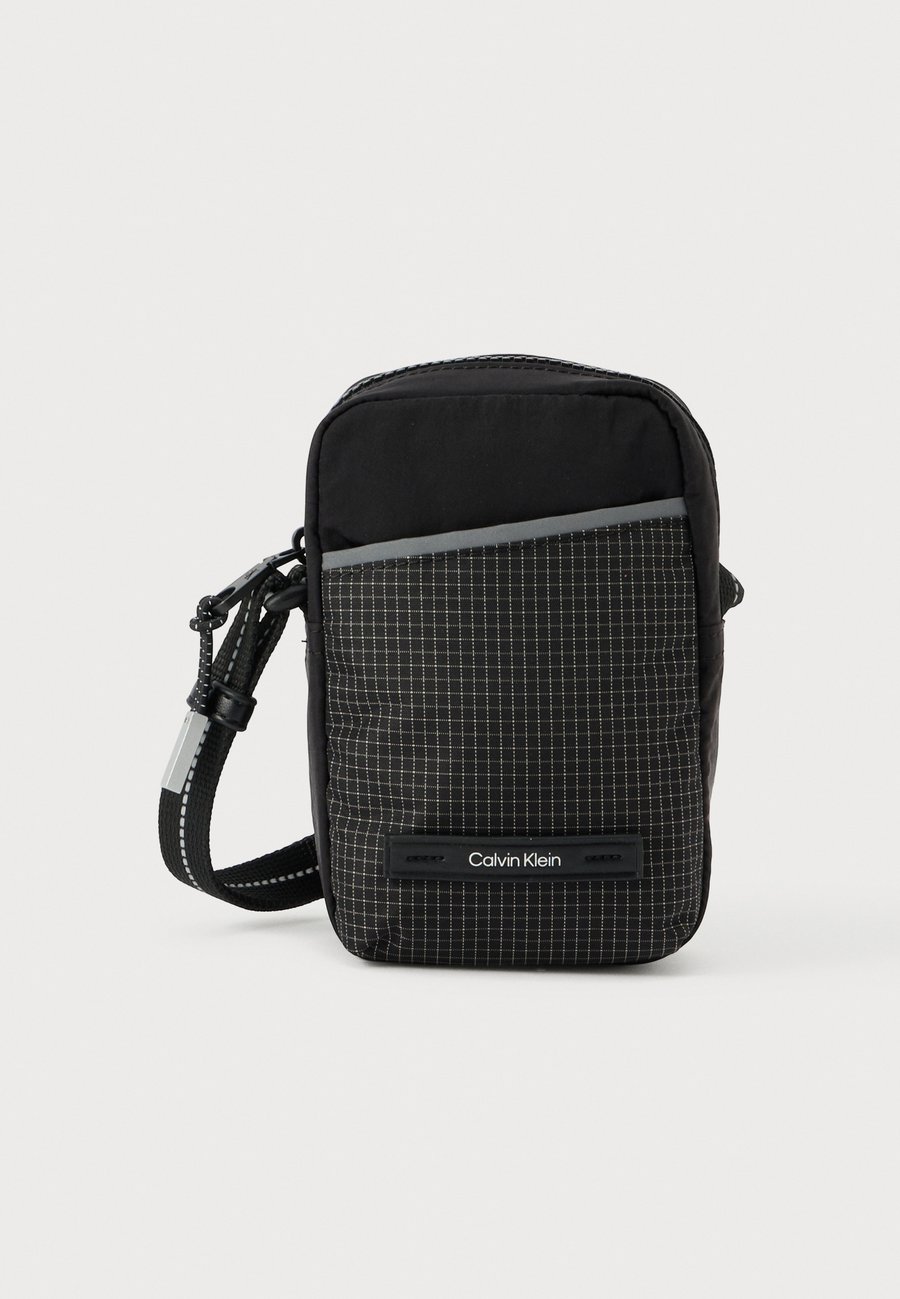 Сумка кросс-боди Calvin Klein REPORTER, Black
Сумка кросс-боди Calvin Klein REPORTER, Black