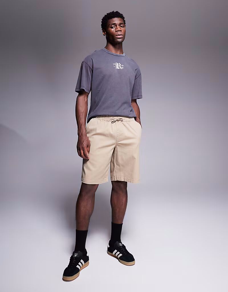 Шорты-чиносы свободного кроя ADPT бежевого цвета
Шорты-чиносы свободного кроя ADPT бежевого цвета