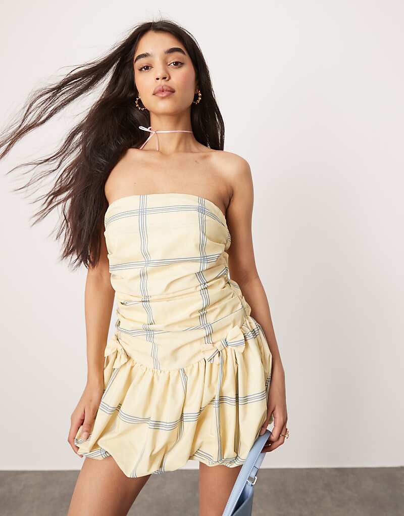 ASOS DESIGN – Ultimate – Желто-синее мини-платье-бандо в клетку с пышной юбкой с бантом
ASOS DESIGN – Ultimate – Желто-синее мини-платье-бандо в клетку с пышной юбкой с бантом