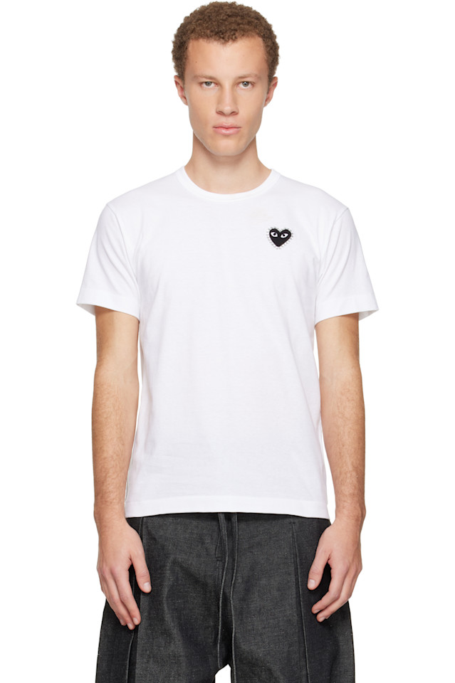 Comme Des Garçons Play Футболка с эмблемой из белых стразов и черным сердцем
Comme Des Garçons Play Футболка с эмблемой из белых стразов и черным сердцем