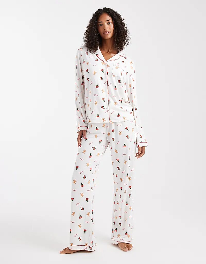 Рождественский комплект из супермягкого трикотажного топа и широких штанин с кремовым рисунком в виде пряничного домика
Рождественский комплект из супермягкого трикотажного топа и широких штанин с кремовым рисунком в виде пряничного домика