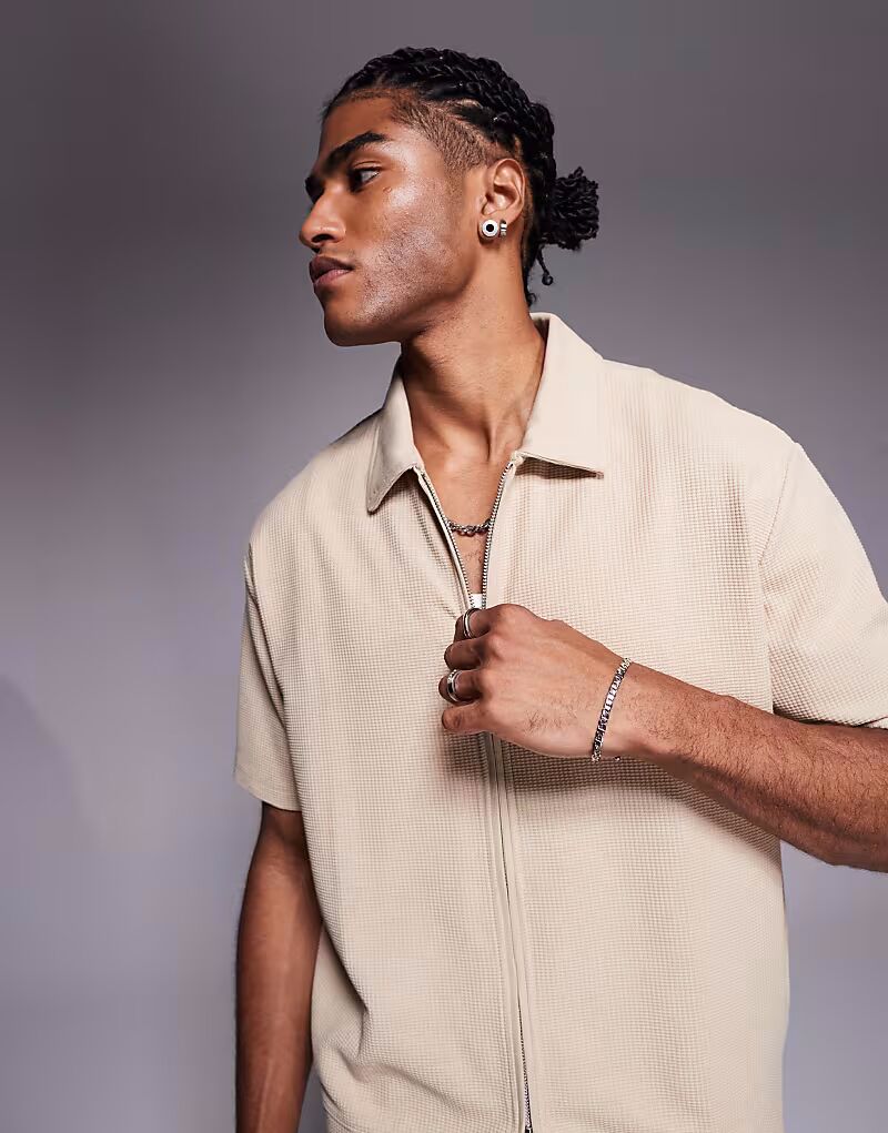 Свободное поло на молнии из коричневой вафельной ткани Asos Design
Свободное поло на молнии из коричневой вафельной ткани Asos Design