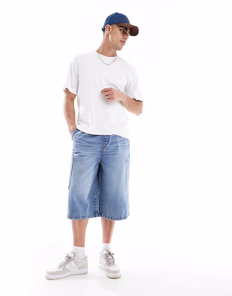 Удлиненные джинсовые шорты ASOS DESIGN темно-синего цвета с карманами-карго
Удлиненные джинсовые шорты ASOS DESIGN темно-синего цвета с карманами-карго