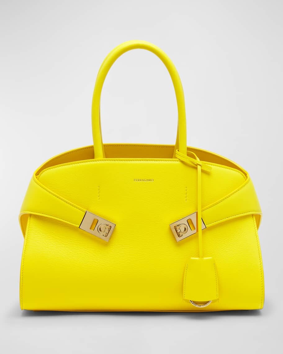 Кожаная сумка Hug Gancini с ручкой сверху Ferragamo
Кожаная сумка Hug Gancini с ручкой сверху Ferragamo