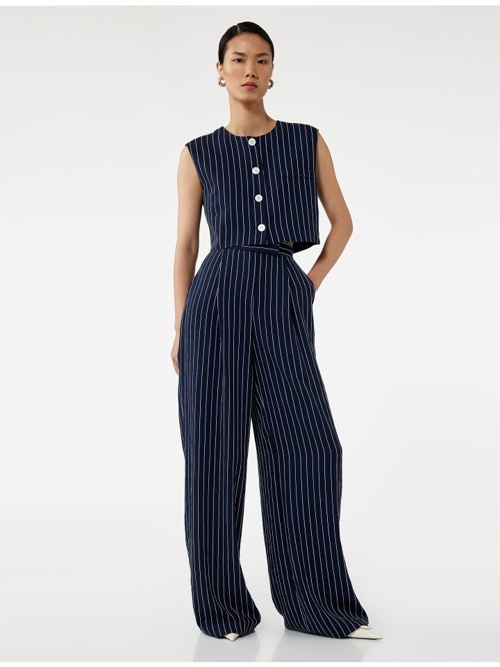 Брюки в темно-синюю полоску KOTON
Брюки в темно-синюю полоску KOTON