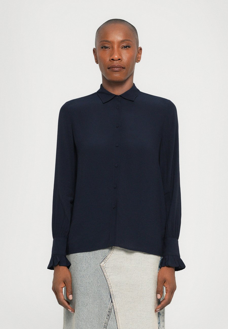 Блуза Zadig & Voltaire THELY SOFT, Encre/Dark Blue
Блуза Zadig & Voltaire THELY SOFT, Encre/Dark Blue