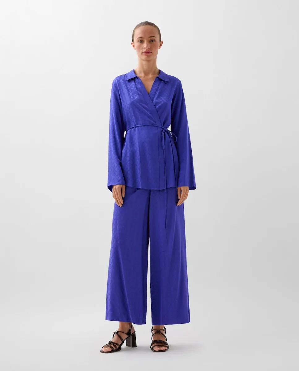 Женские широкие брюки с эластичной талией и жаккардовым принтом Scalpers, синий
Женские широкие брюки с эластичной талией и жаккардовым принтом Scalpers, синий