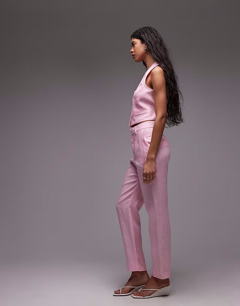 Льняные брюки розового цвета Mango
Льняные брюки розового цвета Mango