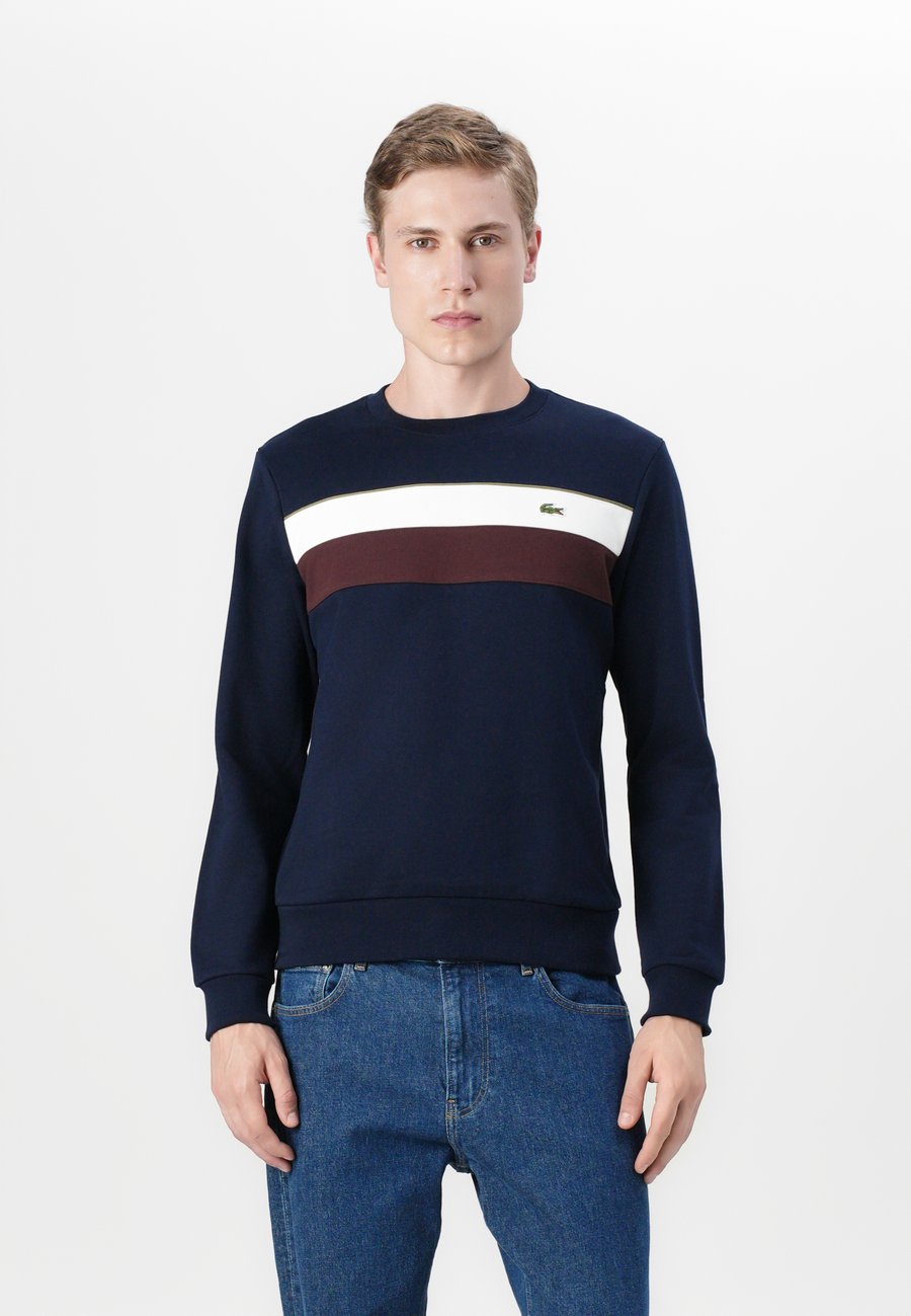 Толстовка Lacoste Sweatshirt, Navy Blue/Flour/Red Vermouth/Dark Blue
Толстовка Lacoste Sweatshirt, Navy Blue/Flour/Red Vermouth/Dark Blue