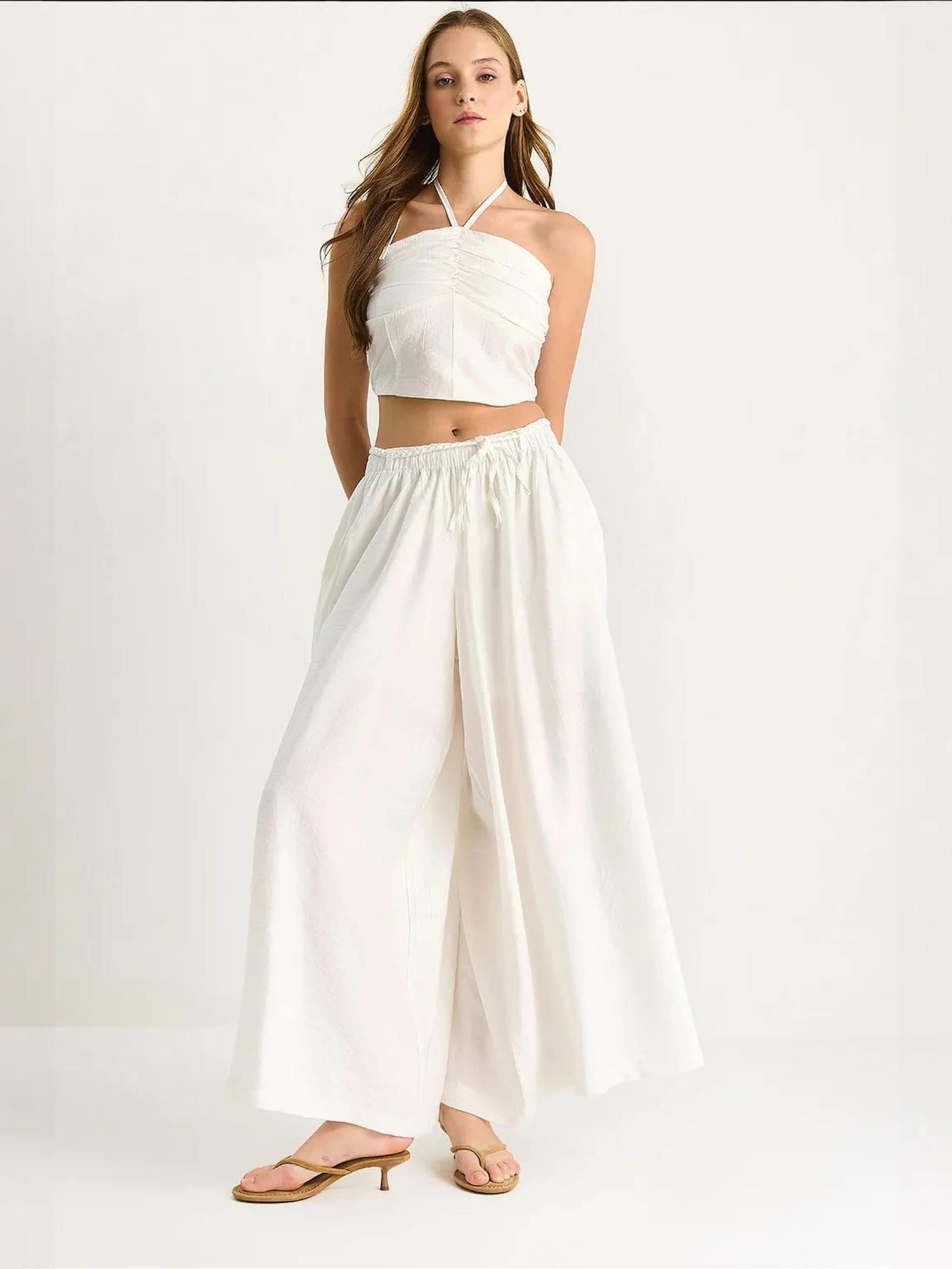 Bianco Lucci Костюм-двойка в белом цвете
Bianco Lucci Костюм-двойка в белом цвете