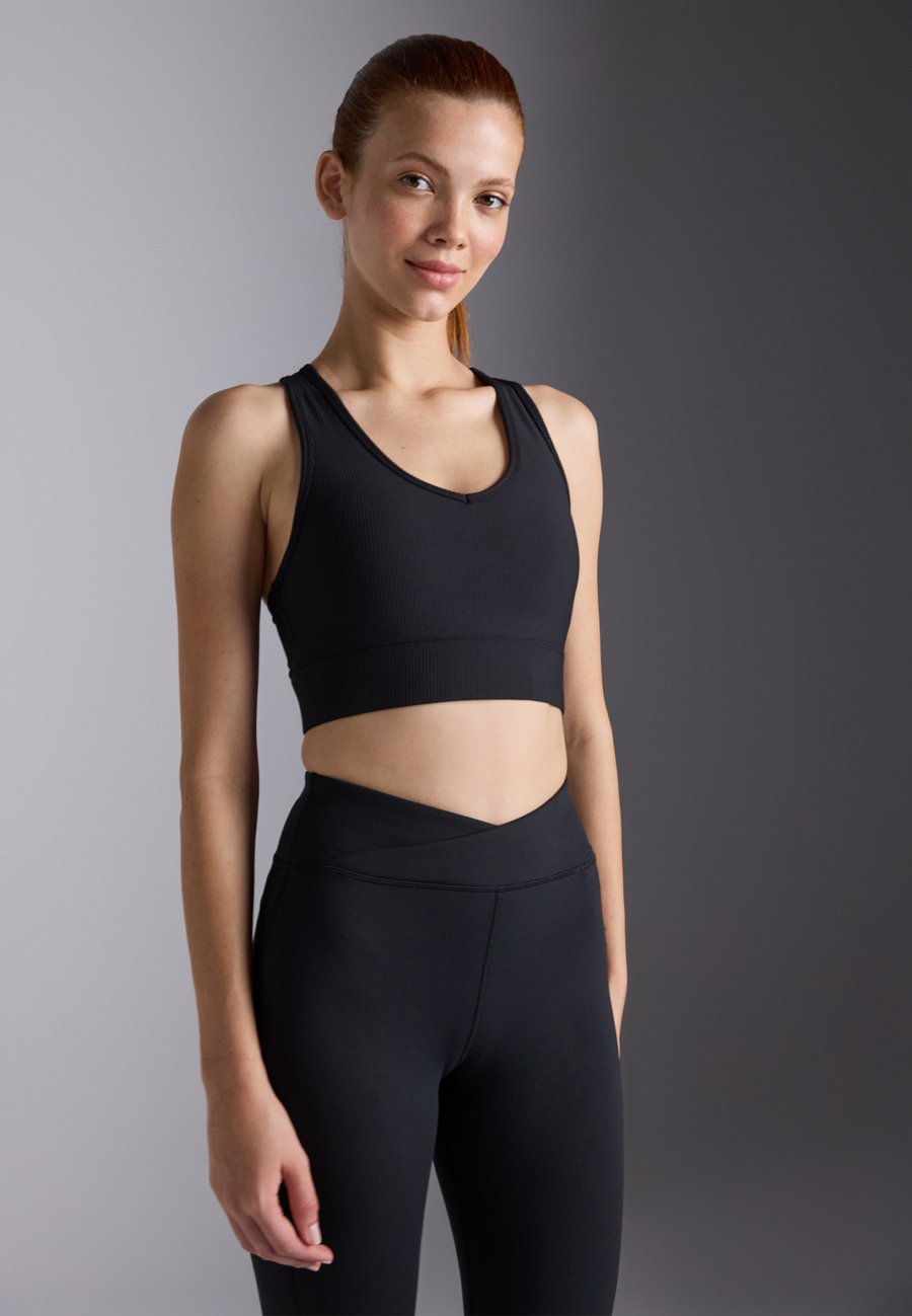 Бюстгальтер Even&Odd active MEDIUM SUPPORT RIBBED SPORTS BRA WITH RACER BACK, Black
Бюстгальтер Even&Odd active MEDIUM SUPPORT RIBBED SPORTS BRA WITH RACER BACK, Black