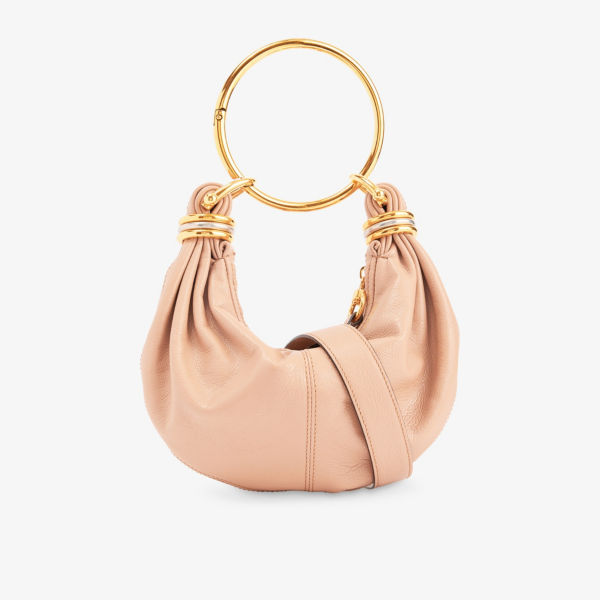 Сумка Hobo Mini Leather Top-Handle-Bag Chloe с металлическими деталями, бежевый
Сумка Hobo Mini Leather Top-Handle-Bag Chloe с металлическими деталями, бежевый