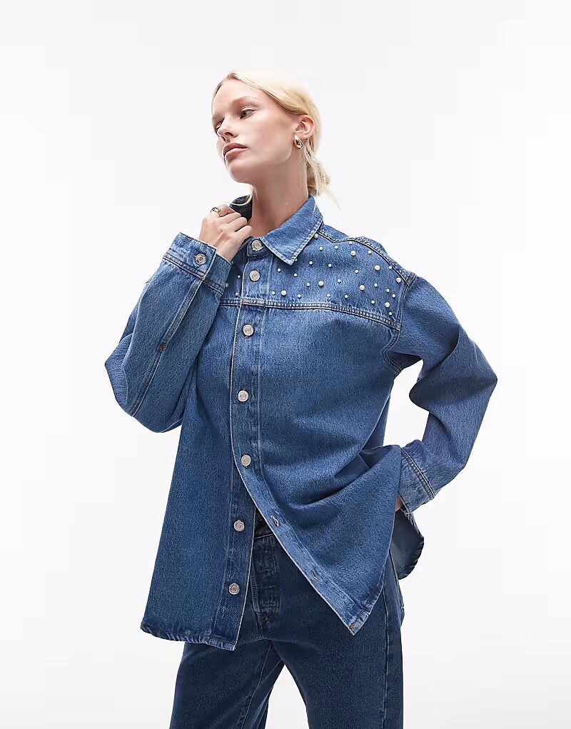 Рубашка свободного кроя из денима ASOS DESIGN с жемчужными вставками в средне-синем цвете
Рубашка свободного кроя из денима ASOS DESIGN с жемчужными вставками в средне-синем цвете