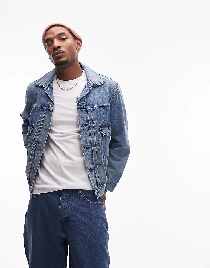 Куртка дальнобойщика тип 2 деним кромка средняя стирка Levi's
Куртка дальнобойщика тип 2 деним кромка средняя стирка Levi's