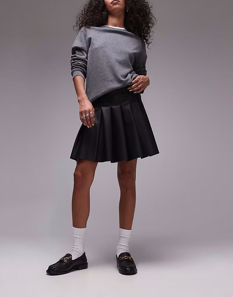 Мини-юбка из искусственной кожи со складками, черного цвета Topshop
Мини-юбка из искусственной кожи со складками, черного цвета Topshop