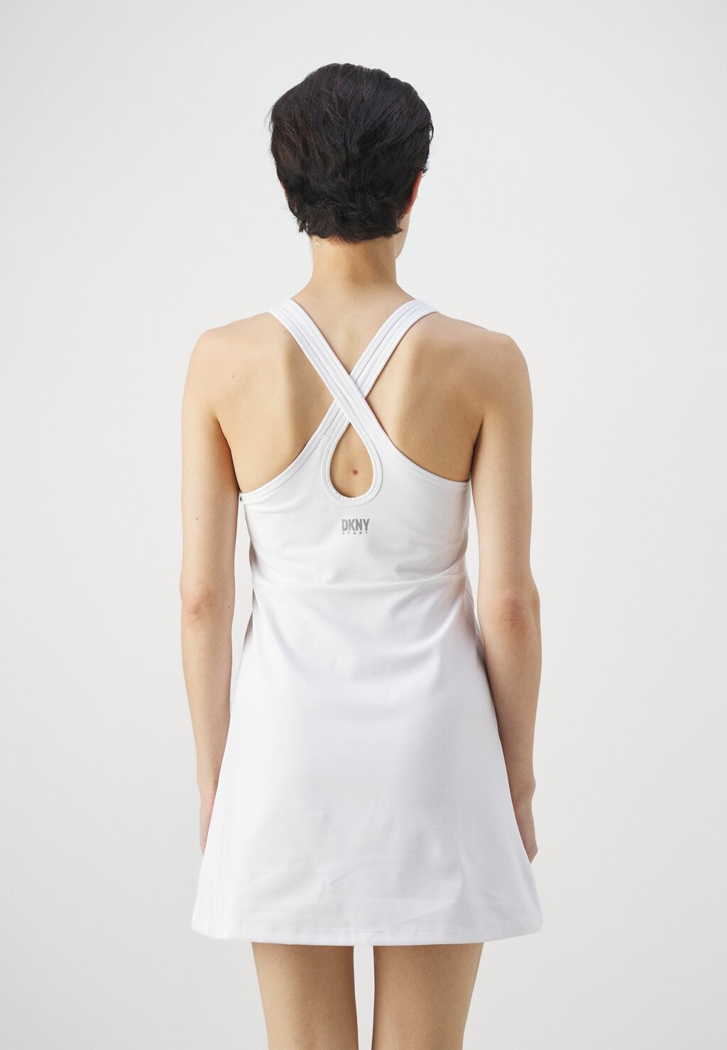Спортивная одежда Logo Tennis Dress Built In Bra DKNY, белая
Спортивная одежда Logo Tennis Dress Built In Bra DKNY, белая