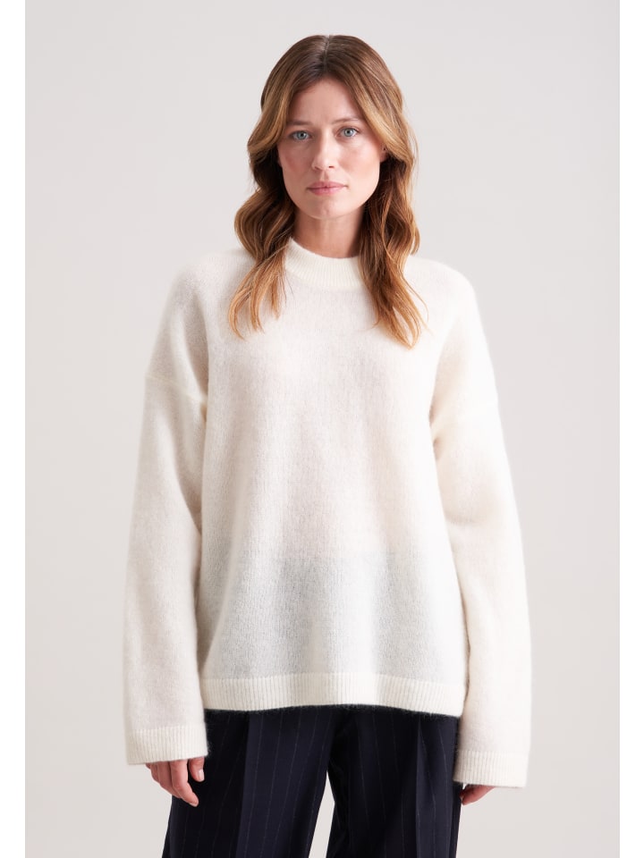 Большой свитер цвета экрю Seidensticker
Большой свитер цвета экрю Seidensticker