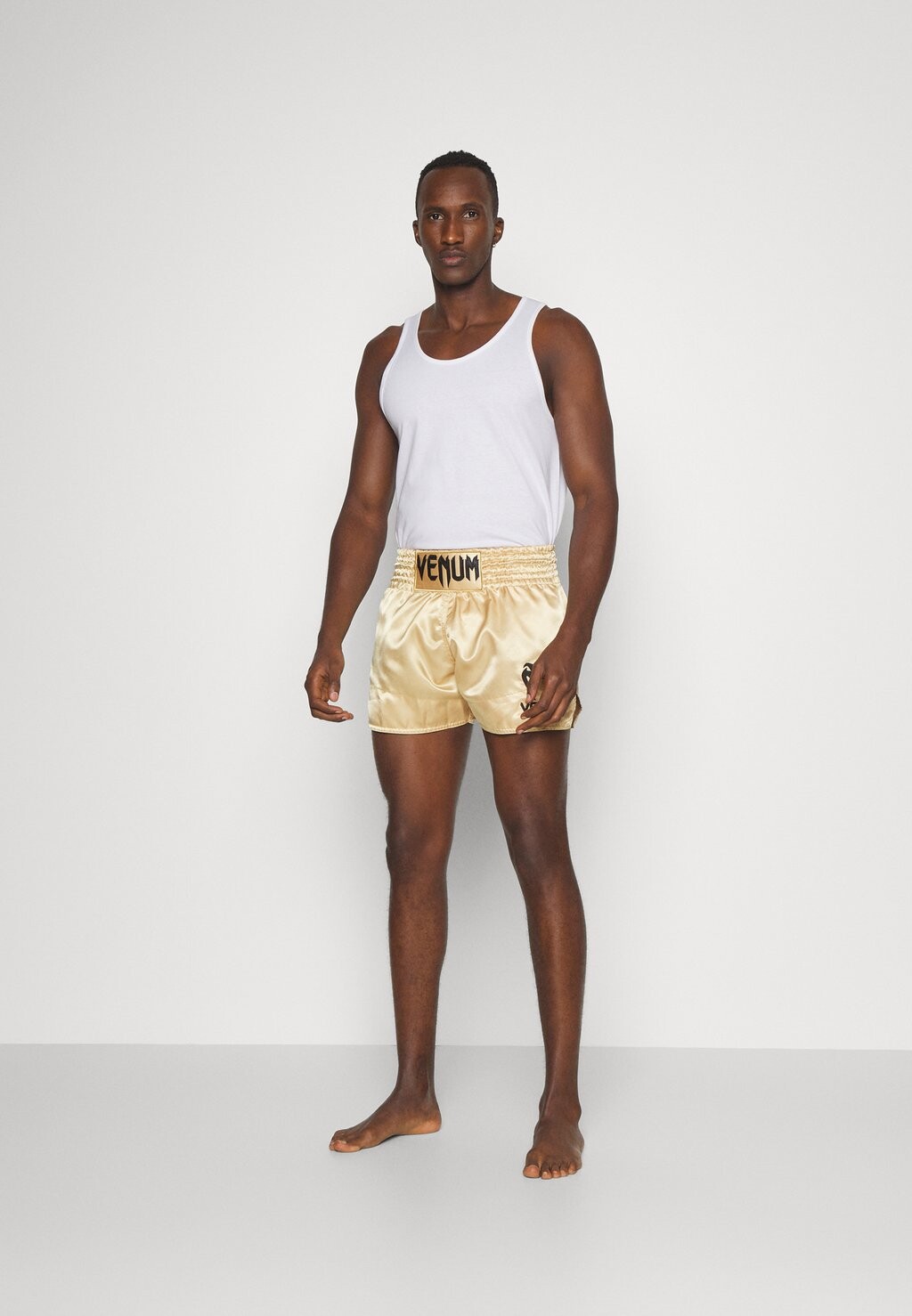 Спортивные шорты Classic Muay Thai Short Venum, цвет gold-coloured/black
Спортивные шорты Classic Muay Thai Short Venum, цвет gold-coloured/black