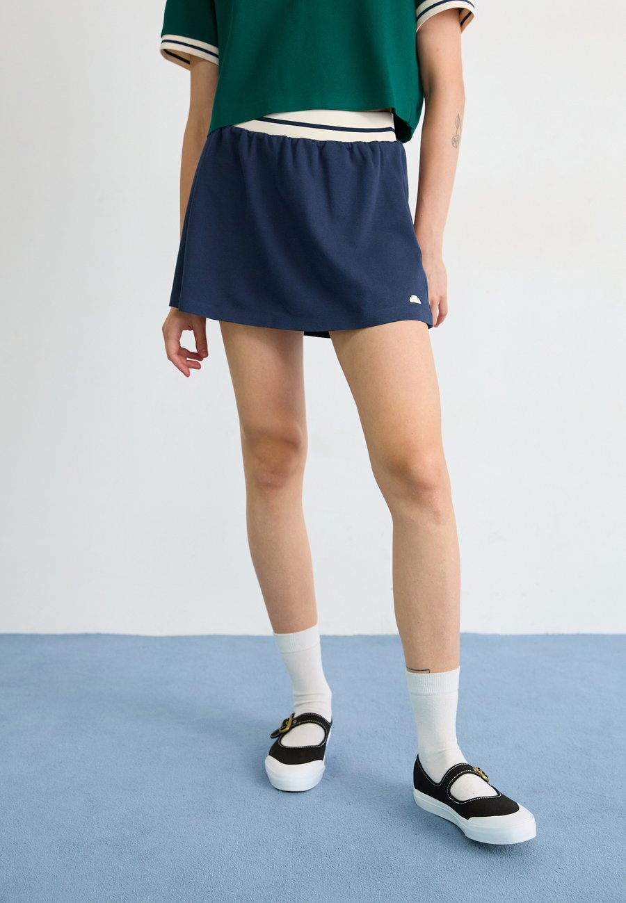Юбка Ellesse BROMONT SKORT, Navy/Dark Blue
Юбка Ellesse BROMONT SKORT, Navy/Dark Blue