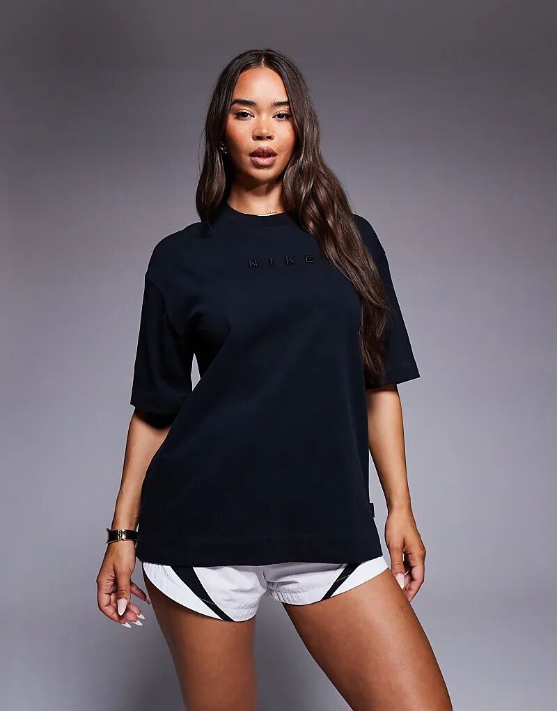 Футболка свободного кроя Nike Luxe черного цвета
Футболка свободного кроя Nike Luxe черного цвета
