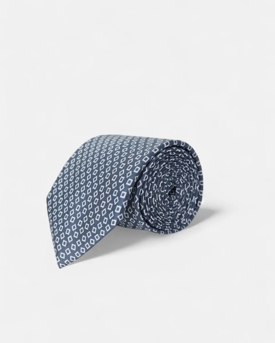 Галстук с узором в неровную клетку темно-синего цвета Silbon
Галстук с узором в неровную клетку темно-синего цвета Silbon