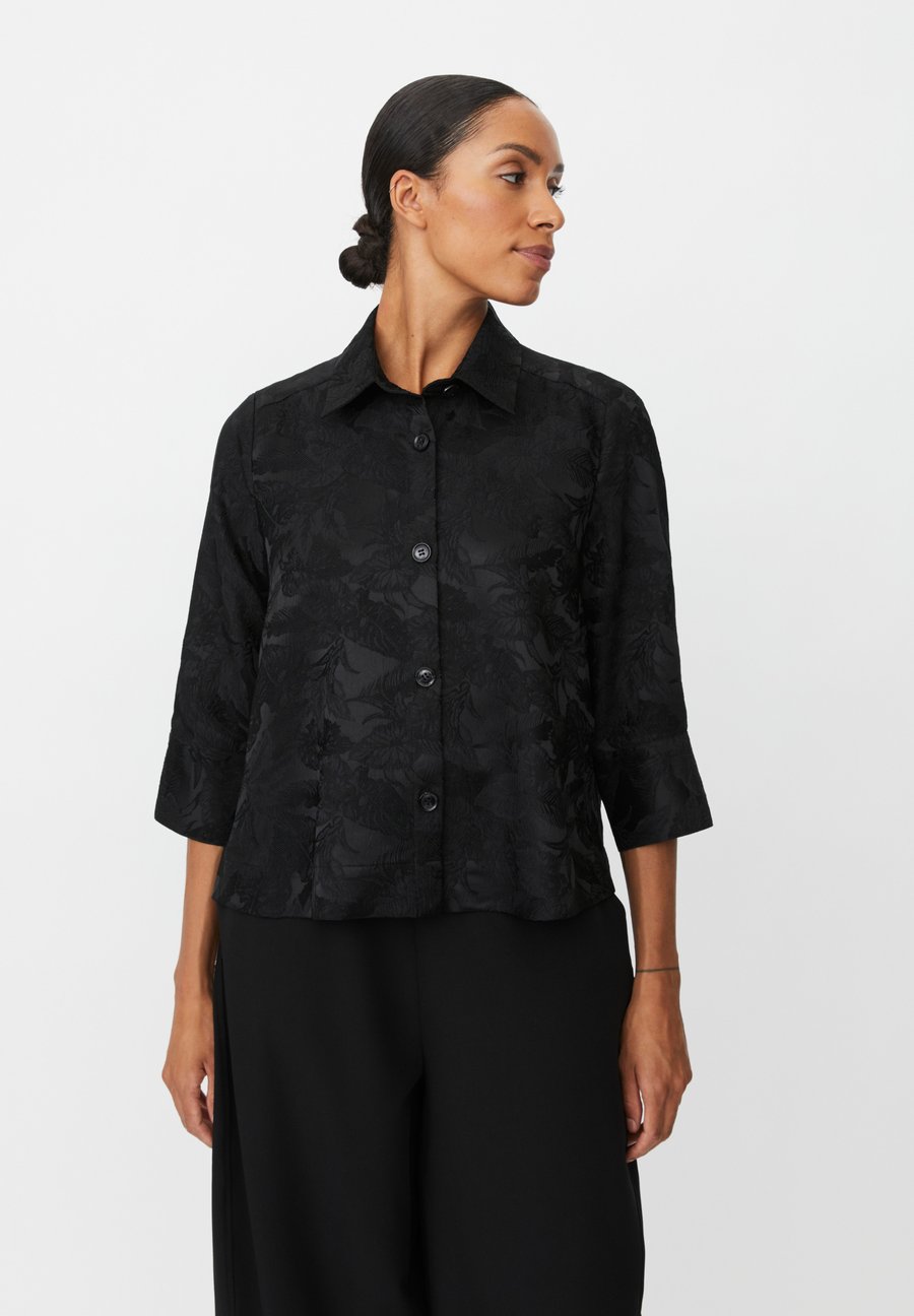 Блуза Masai MaIdakaia, Schwarz/Black
Блуза Masai MaIdakaia, Schwarz/Black