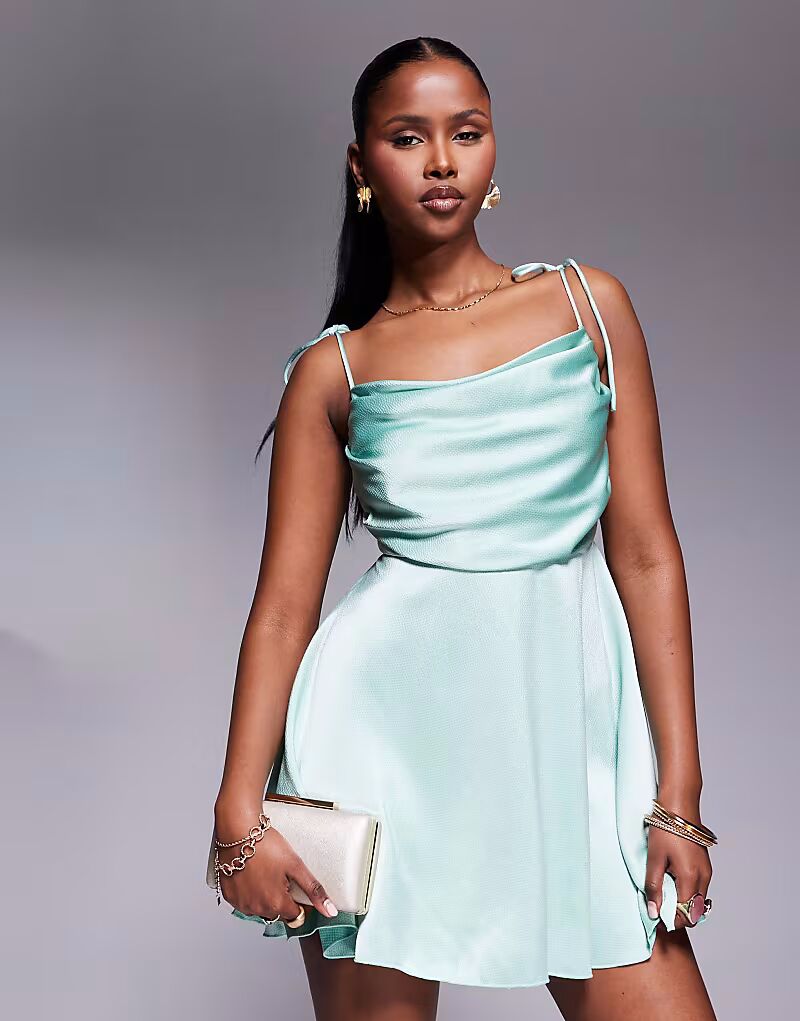 Редкое лондонское атласное мини-платье с завязками на груди, бирюзового цвета Rare
Редкое лондонское атласное мини-платье с завязками на груди, бирюзового цвета Rare
