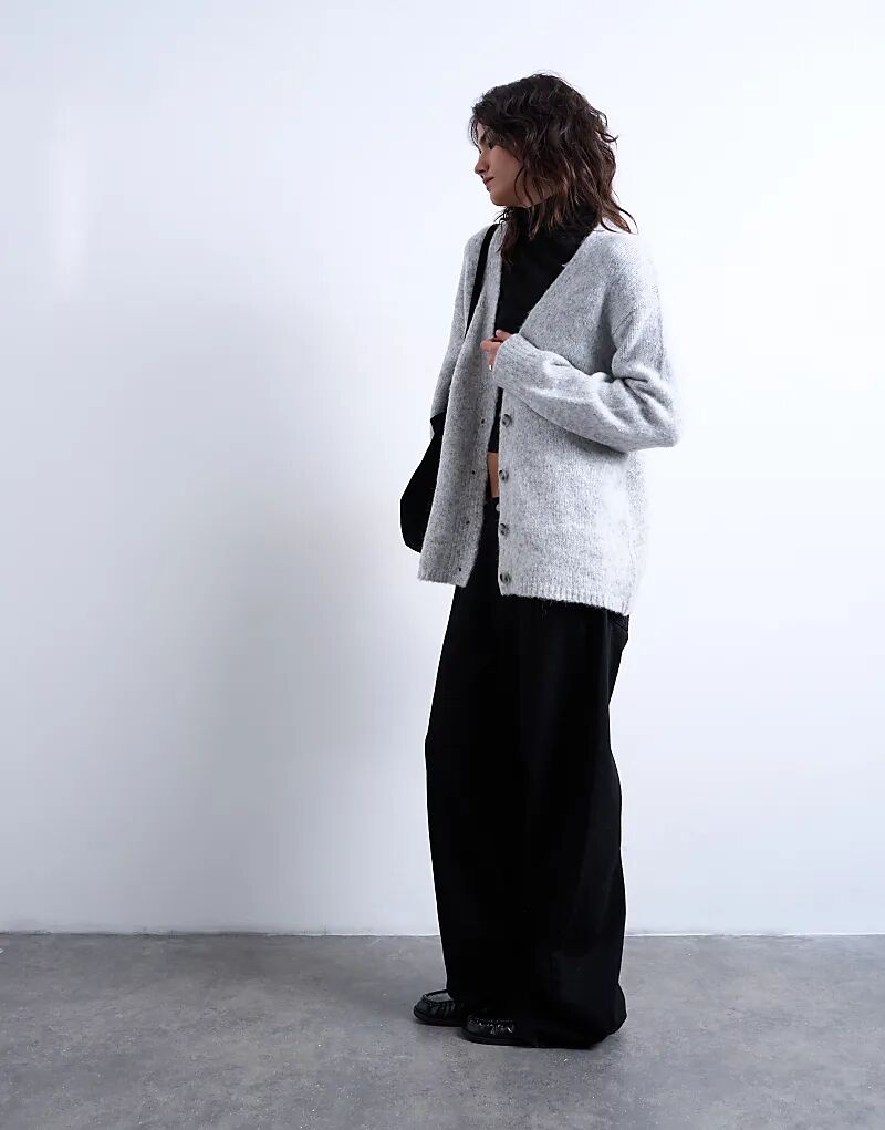 Вязаный удлиненный кардиган Topshop серого цвета
Вязаный удлиненный кардиган Topshop серого цвета