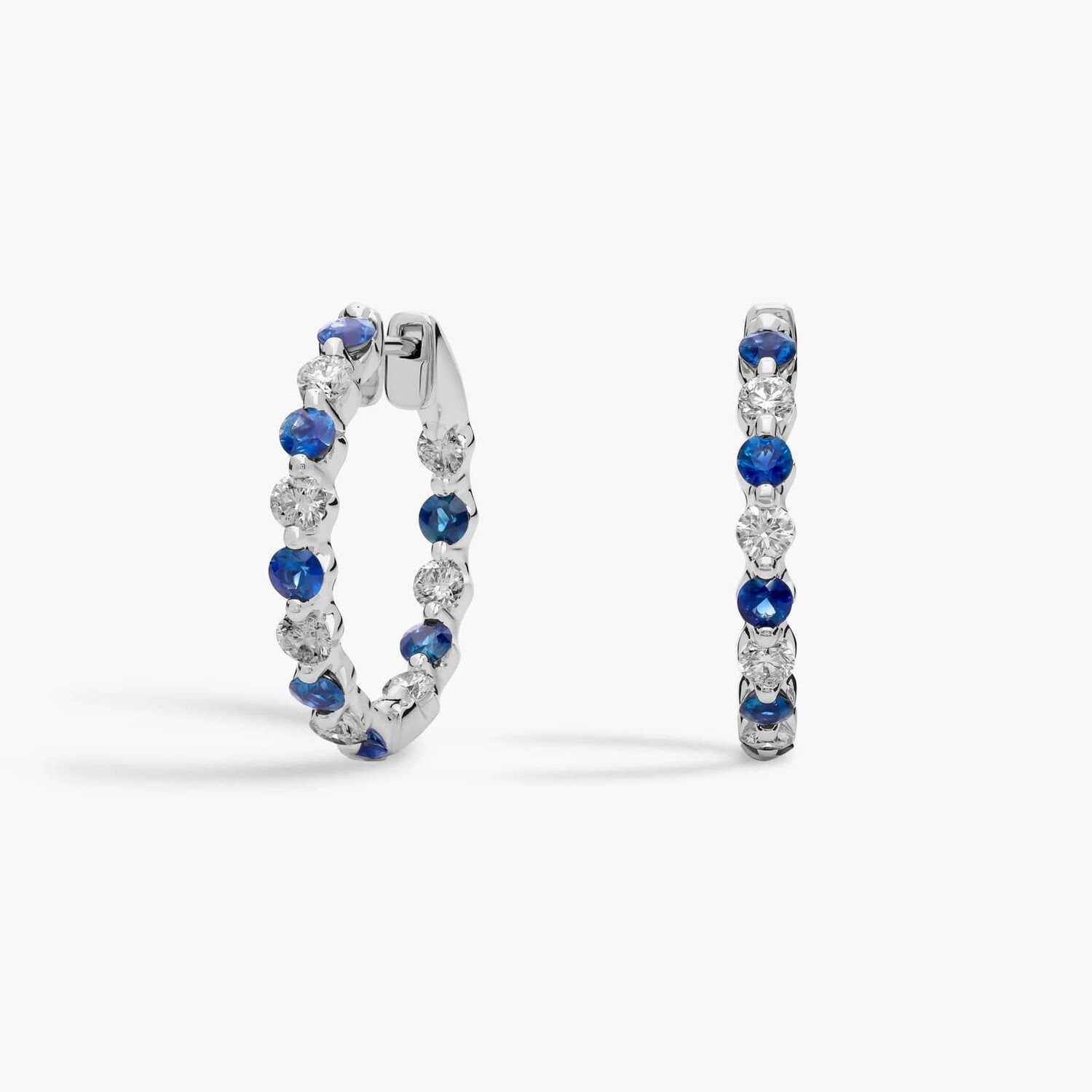 Серьги-кольца с плавающими сапфирами и бриллиантами из 14-каратного белого золота Blue Nile
Серьги-кольца с плавающими сапфирами и бриллиантами из 14-каратного белого золота Blue Nile
