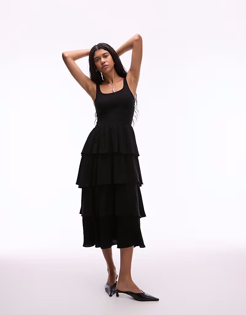 & Other Stories платье мидакси без рукавов с развевающимися оборками из черного рубчатого джерси и тканого материала
& Other Stories платье мидакси без рукавов с развевающимися оборками из черного рубчатого джерси и тканого материала