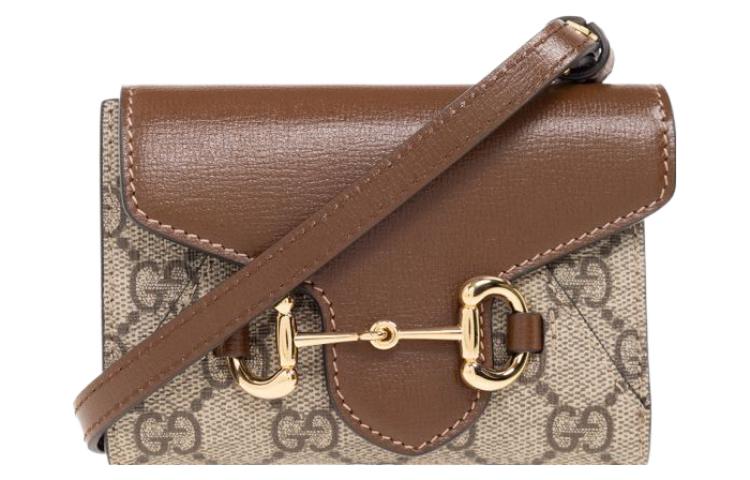 Конвертируемая сумка через плечо Horsebit 1955 из холста с кожаными вставками мини женская бежевая/эбони GUCCI с кошельком для монет и карт
Конвертируемая сумка через плечо Horsebit 1955 из холста с кожаными вставками мини женская бежевая/эбони GUCCI с кошельком для монет и карт