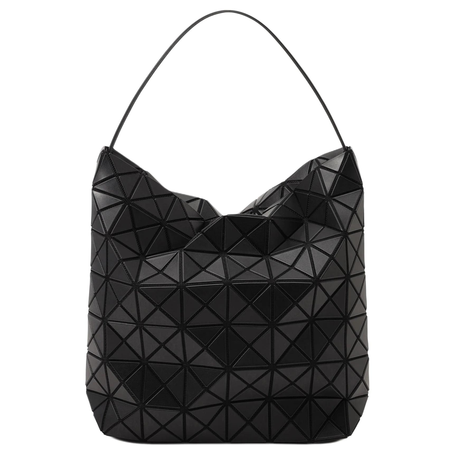 ISSEY MIYAKE Большая женская сумка из ПВХ черная
ISSEY MIYAKE Большая женская сумка из ПВХ черная