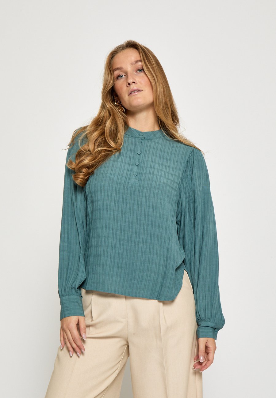 Блуза Minus Blouse, North Atlantic/Dark Green
Блуза Minus Blouse, North Atlantic/Dark Green