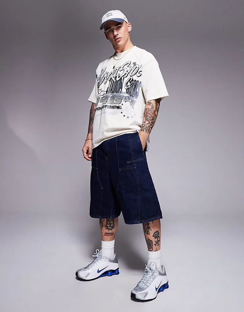 Джинсовые шорты с вставками по бокам и вышитым логотипом на заднем кармане цвета индиго
Джинсовые шорты с вставками по бокам и вышитым логотипом на заднем кармане цвета индиго