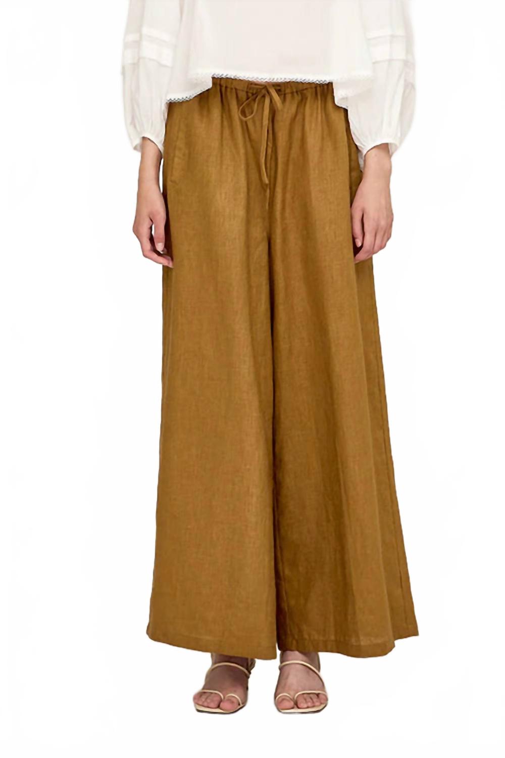 Длинные льняные брюки в оливково-коричневом цвете GRADE & GATHER
Длинные льняные брюки в оливково-коричневом цвете GRADE & GATHER