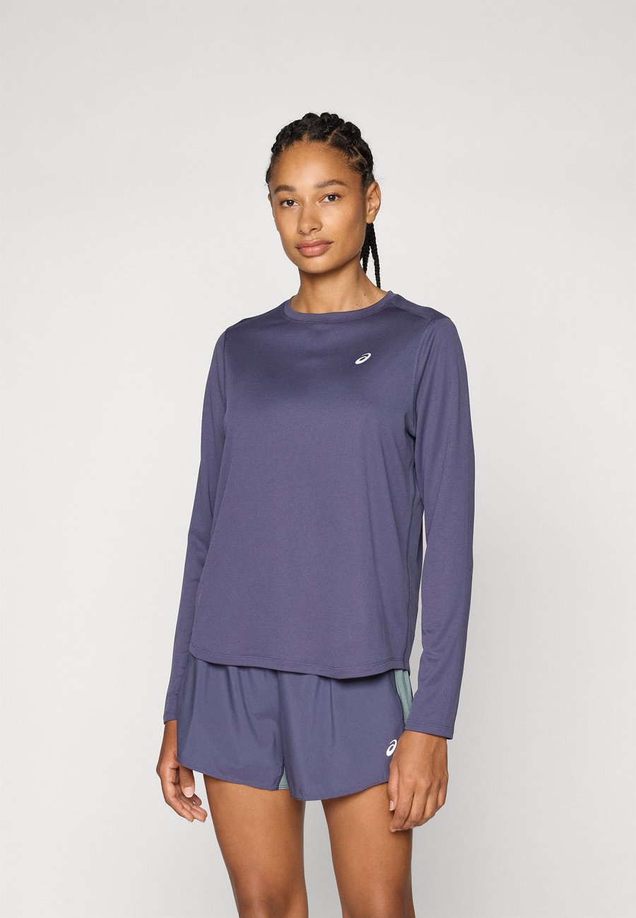 Топ ASICS CORE TOP, Indigo Fog/Lilac
Топ ASICS CORE TOP, Indigo Fog/Lilac