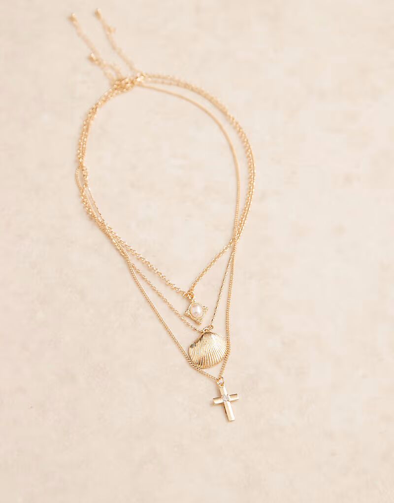 Набор из 3 ожерелий с подвесками из золота Asos Design
Набор из 3 ожерелий с подвесками из золота Asos Design