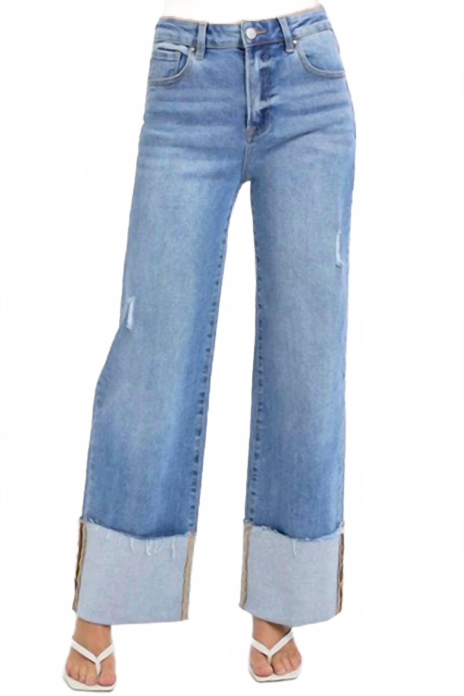 Синие джинсы с широкими манжетами и высокой посадкой RISEN
Синие джинсы с широкими манжетами и высокой посадкой RISEN