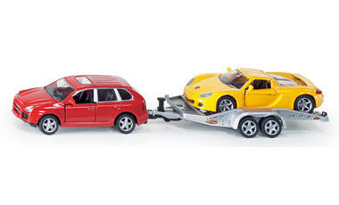 Siku, модель Porsche Cayenne Turbo с прицепом и Porsche Carrera GT.
Siku, модель Porsche Cayenne Turbo с прицепом и Porsche Carrera GT.