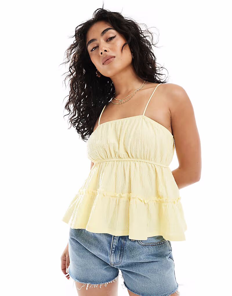 Топ Miss Selfridge из сирсакера с баской и кромкой лимонного цвета
Топ Miss Selfridge из сирсакера с баской и кромкой лимонного цвета