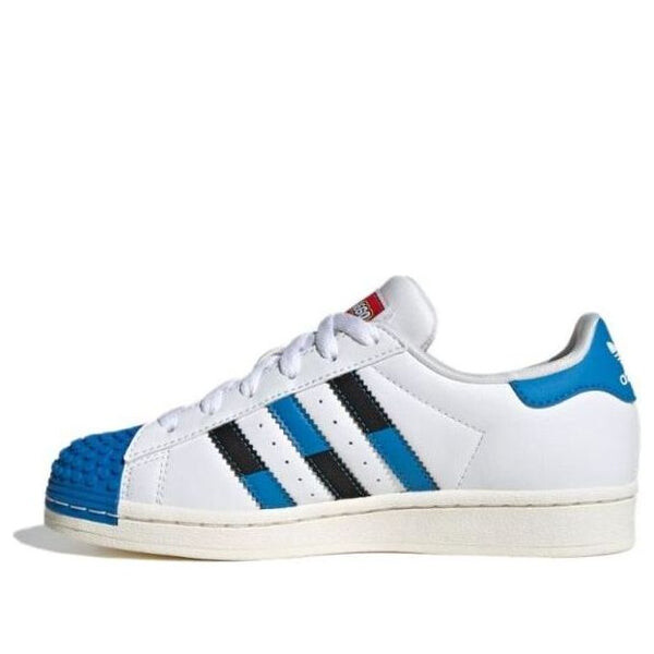 Кроссовки суперзвезда x лего Adidas, белый
Кроссовки суперзвезда x лего Adidas, белый