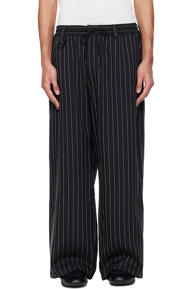 Y-3 Черные спортивные штаны в тонкую полоску
Y-3 Черные спортивные штаны в тонкую полоску