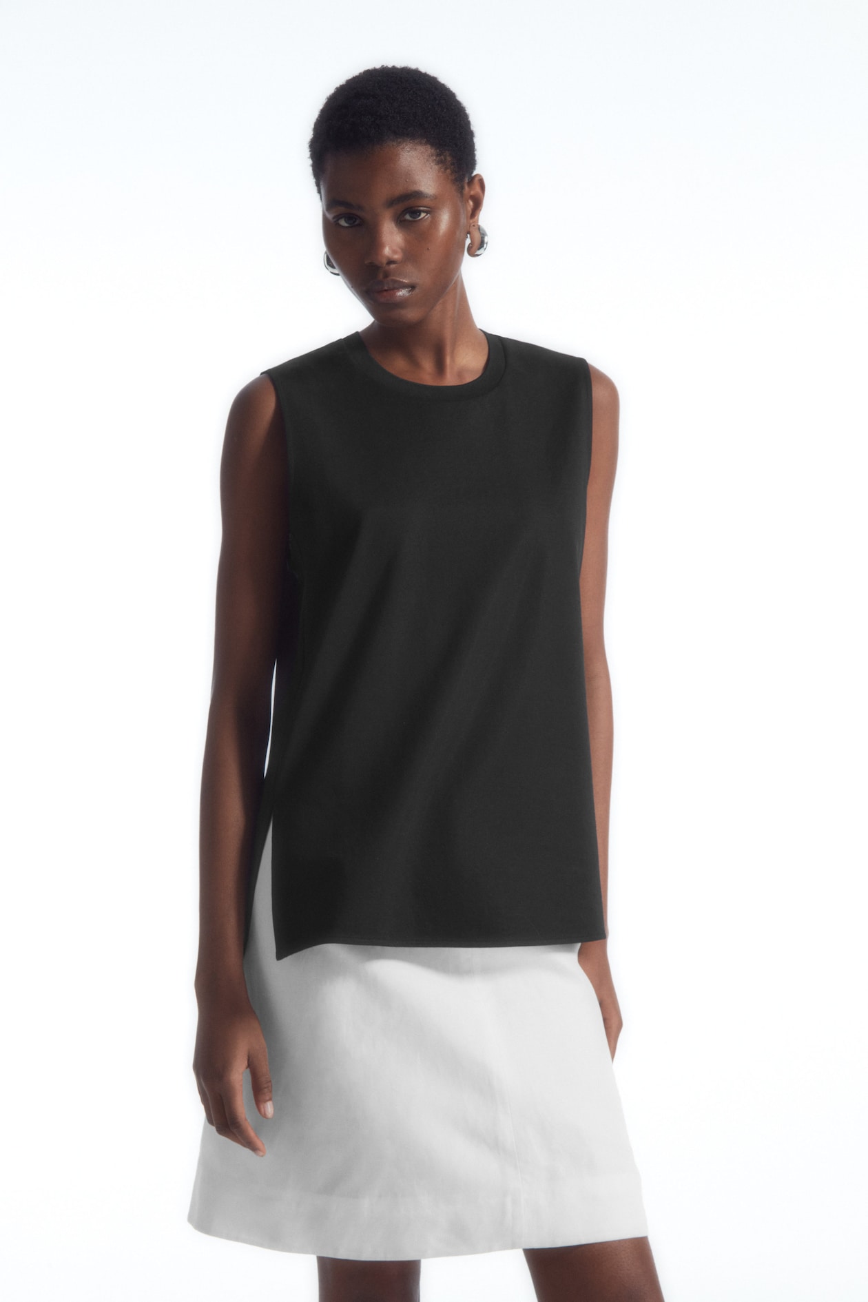 Топ с разрезами внизу COS, черный
Топ с разрезами внизу COS, черный