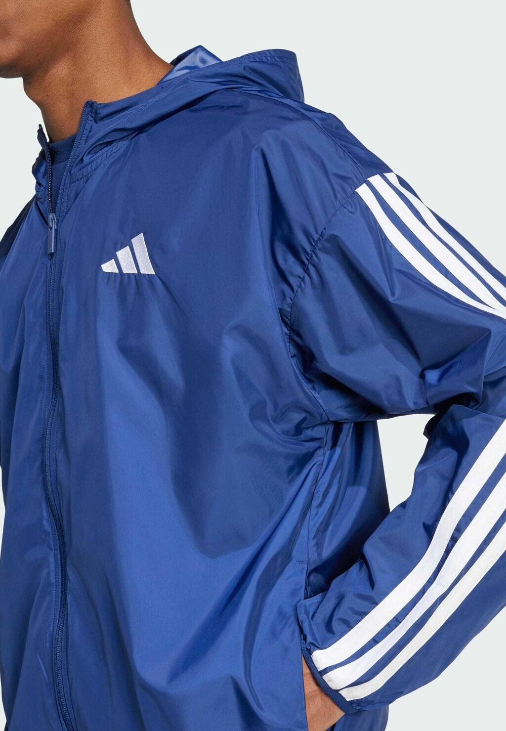 Ветровка ESSENTIAL THREE STRIPES adidas Sportswear, синий
Ветровка ESSENTIAL THREE STRIPES adidas Sportswear, синий