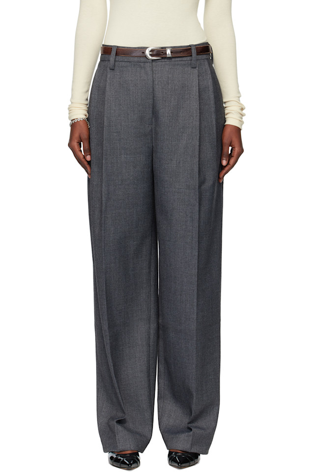 Tonywack Серые плиссированные шерстяные брюки классического кроя
Tonywack Серые плиссированные шерстяные брюки классического кроя