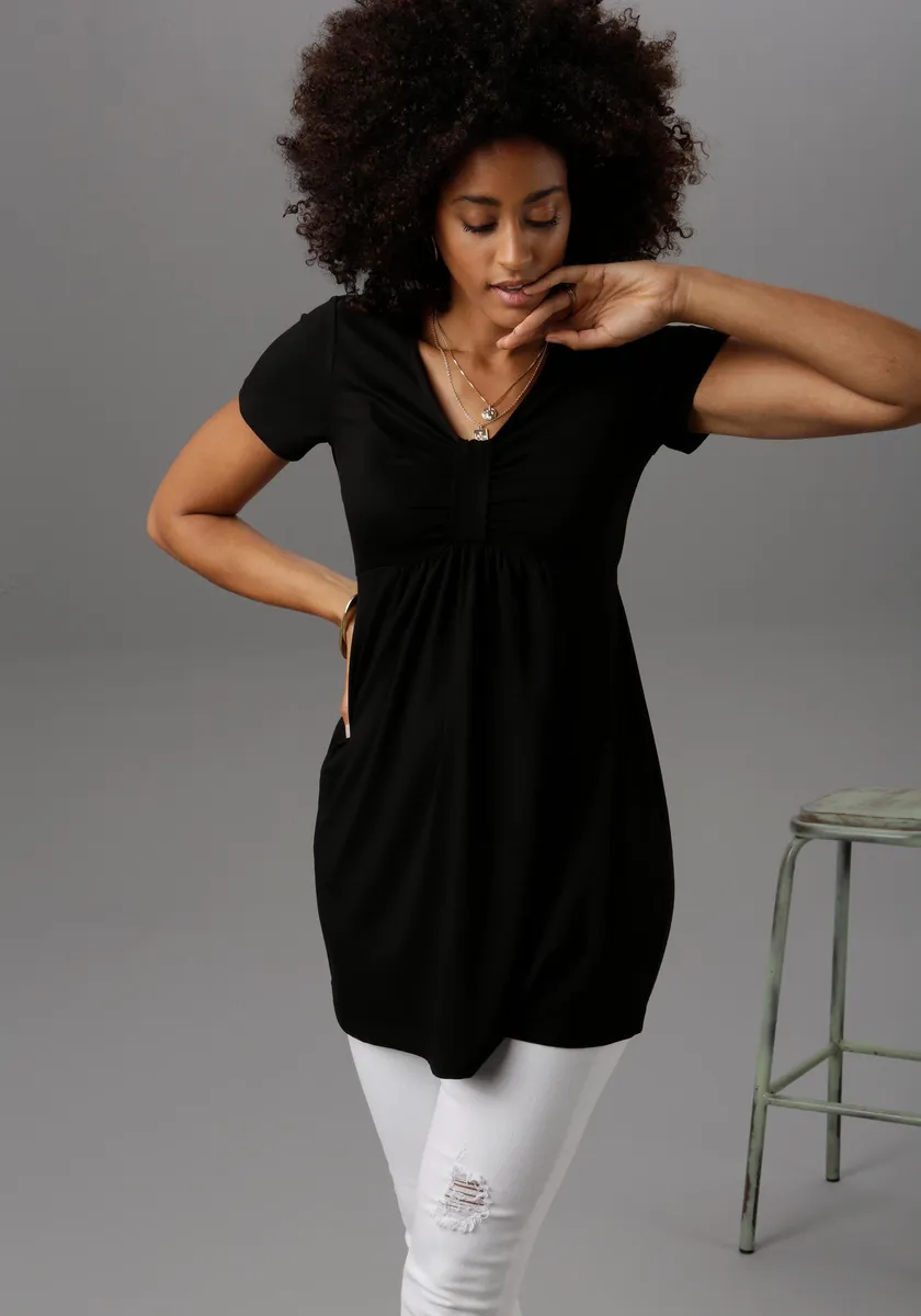 Туника Aniston SELECTED с рюшами в области груди, черный
Туника Aniston SELECTED с рюшами в области груди, черный