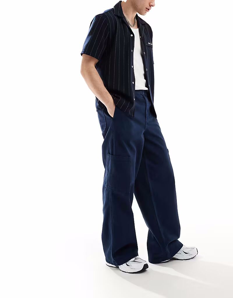 Супер мешковатые брюки-карго ASOS DESIGN темно-синего цвета
Супер мешковатые брюки-карго ASOS DESIGN темно-синего цвета