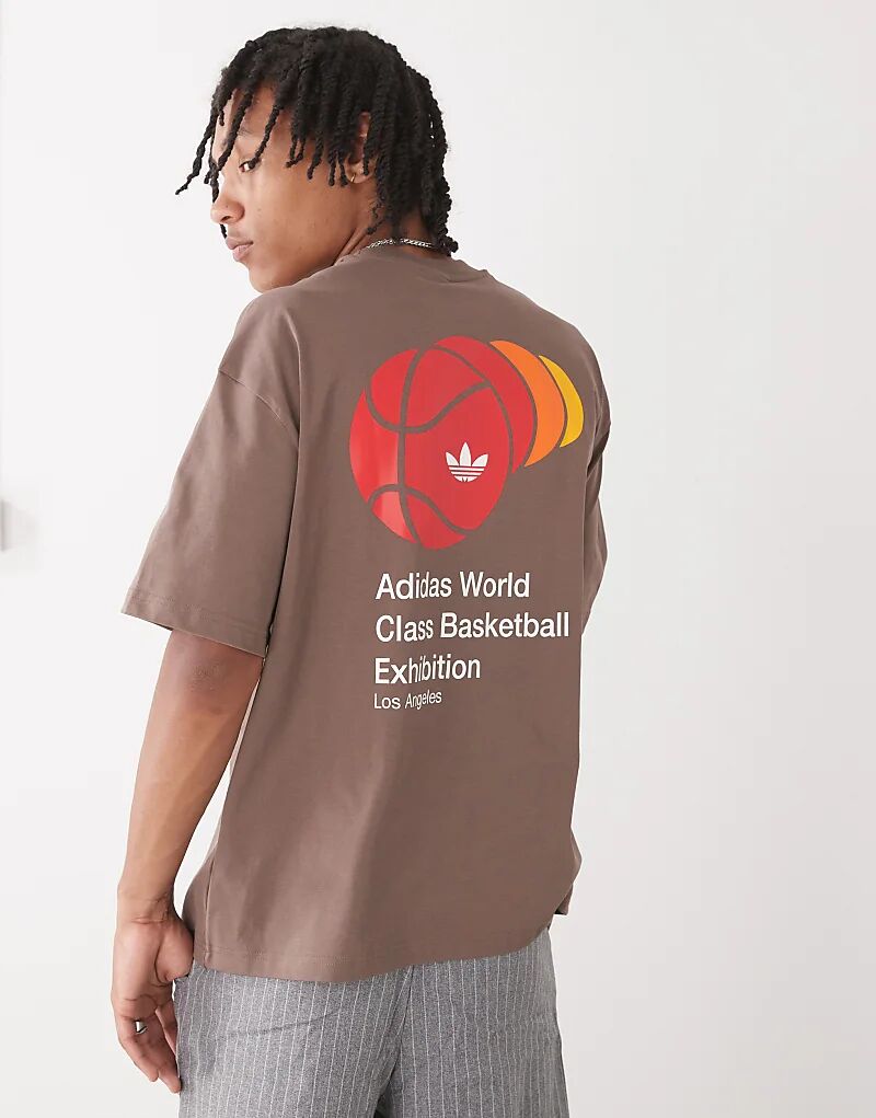 Баскетбольная футболка мирового класса adidas Originals коричневого цвета
Баскетбольная футболка мирового класса adidas Originals коричневого цвета