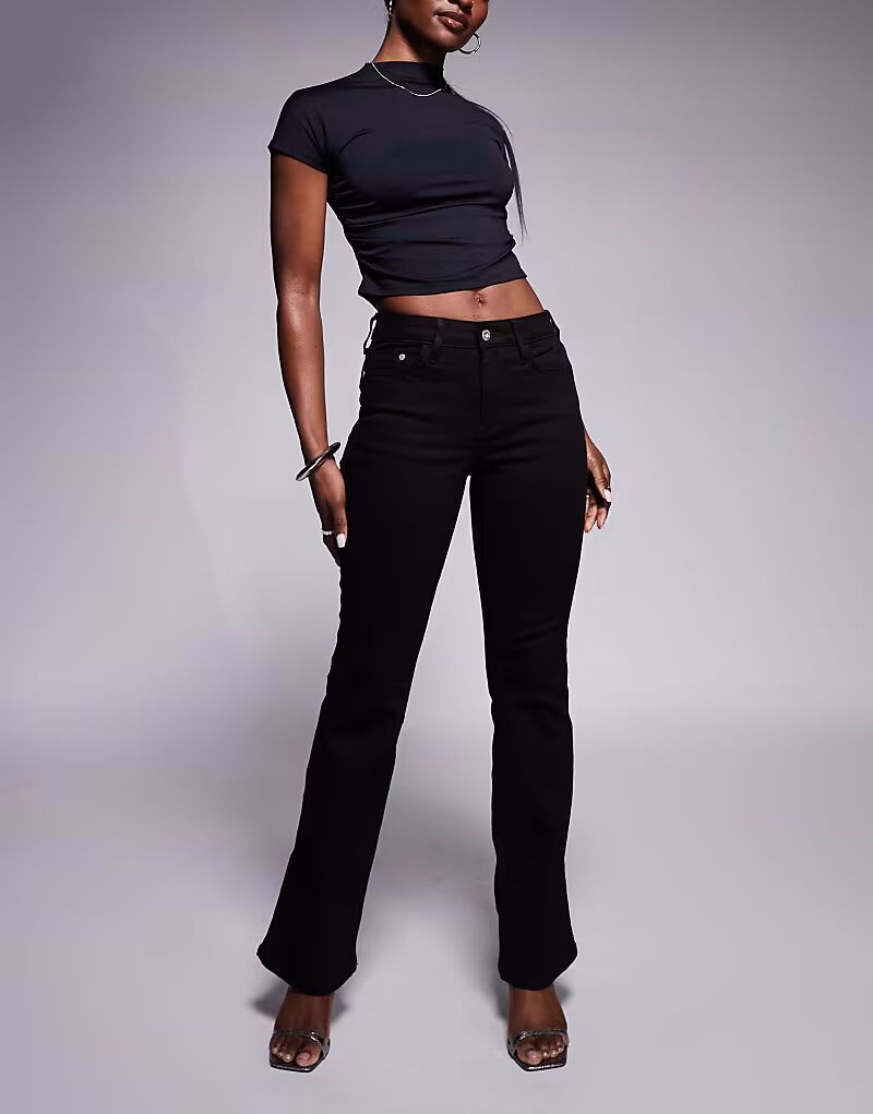 Джинсы River Island со средней посадкой, расклешенные, черного цвета
Джинсы River Island со средней посадкой, расклешенные, черного цвета